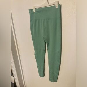 Playboy leggings in a mint green color in size Large. Good Condition
